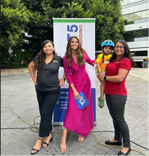 (left to right) Crystal Montejo, child passenger safety technician at San Bernardino County Department of Public Health, Jennifer Lahmers, anchor, Fox Channel 11 Good Day LA, and Mary Curtis Santoyo, office assistant III at First 5 San Bernardino with son, Orion.